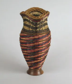“Broken Spiral with Walnut Wood” Mixed Media Basket with Hand Turned Wood Base and Lip